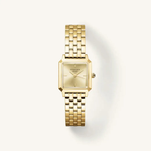 Goldkleurige vierkante polshorloge van The Boxelle merk met gouden staalband